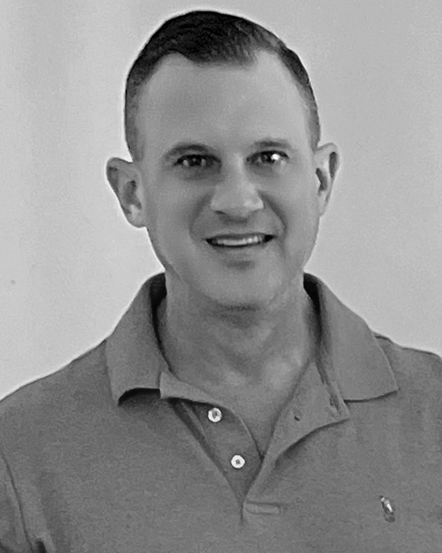 Jeff Mark, EAS Curator. Black and white portrait.